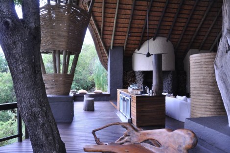 The bar in the main lodge, looking out over the Sand River