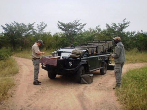The Land Rover; the radiator guard swings up to be a cocktail table...