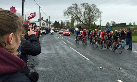Cheering and Yarn bombing, despite the rain...the small band of intrepid riders breaking away from the peloton
